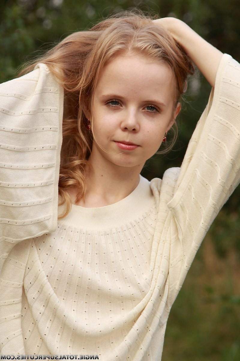 16P Tiny teen girl topless outdoors