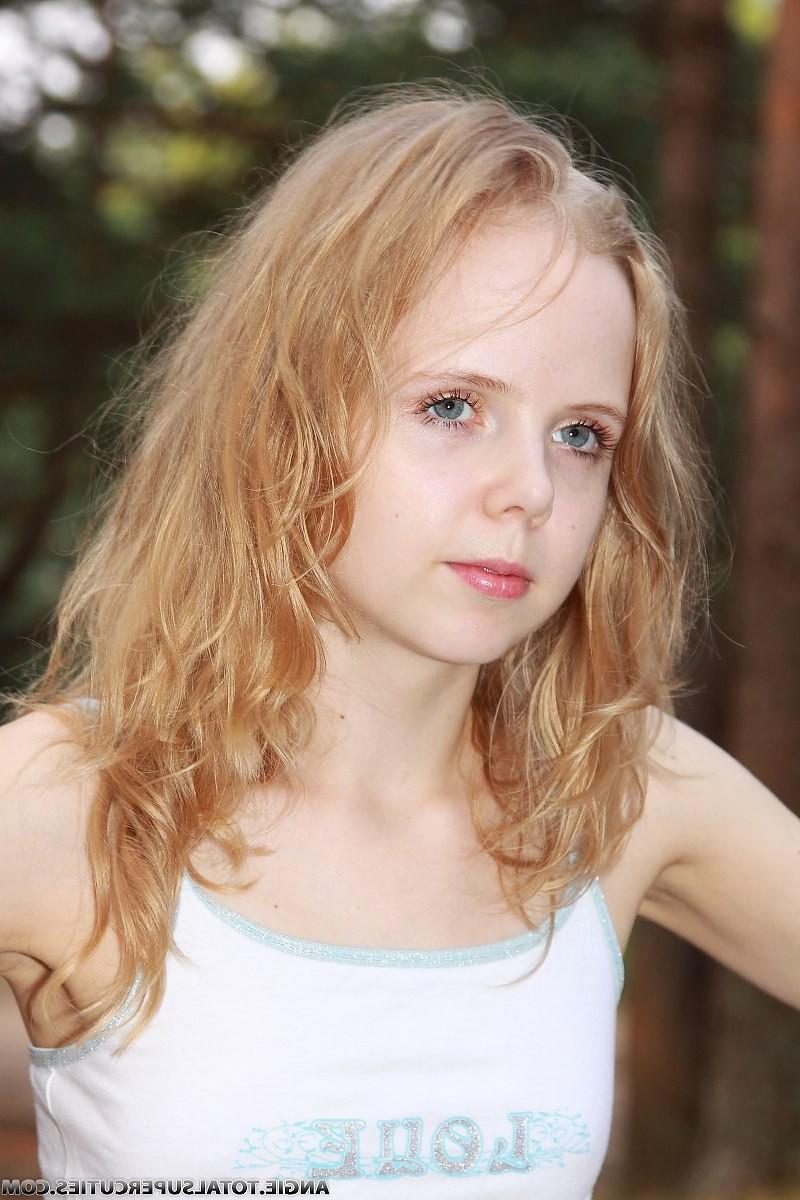 16P Tiny teen girl topless outdoors