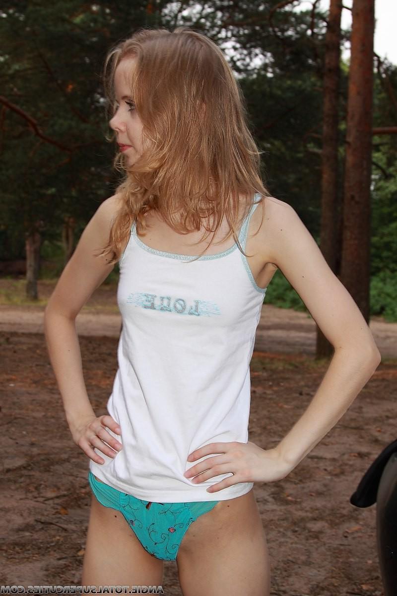 16P Tiny teen girl topless outdoors