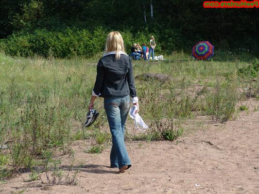 16P Blonde teen peeing on the river beach