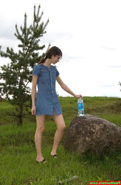 16P Nasty chick in jeans skirt peeing at the nature