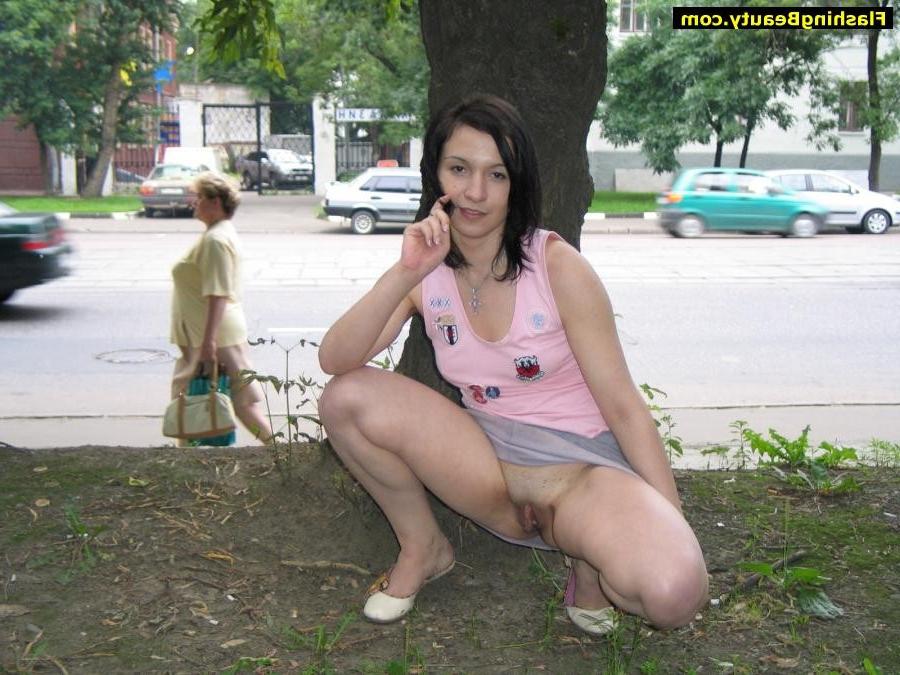 17P Amateur girl showing her shaven pussy in public