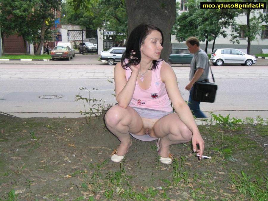 17P Amateur girl showing her shaven pussy in public
