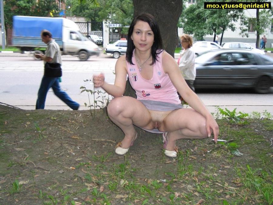 17P Amateur girl showing her shaven pussy in public
