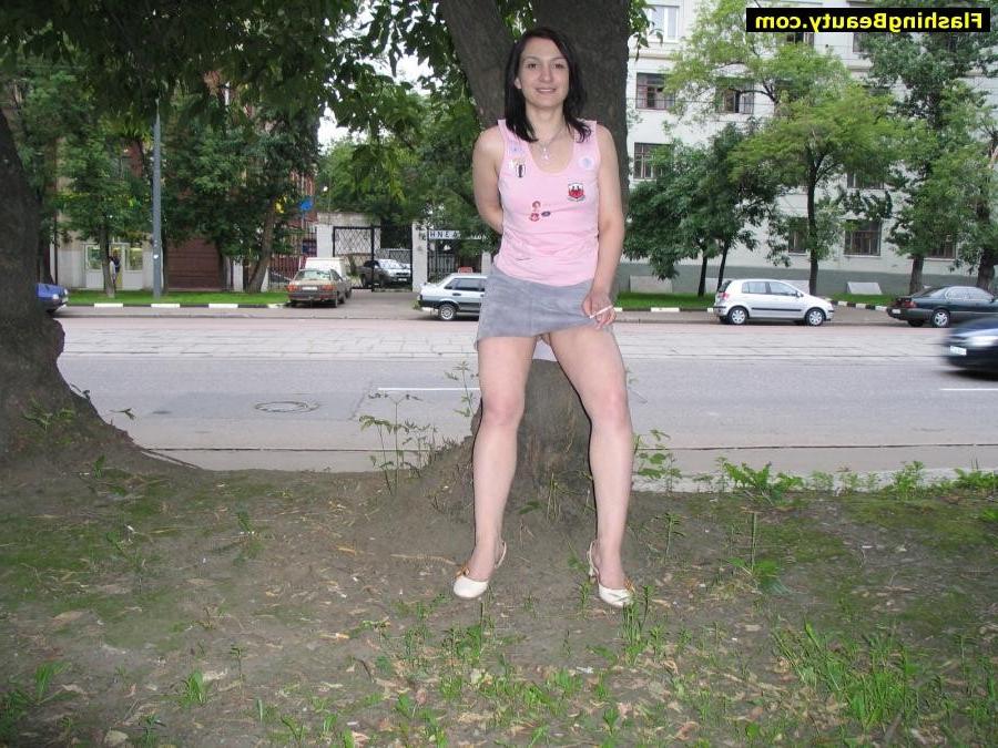 17P Amateur girl showing her shaven pussy in public