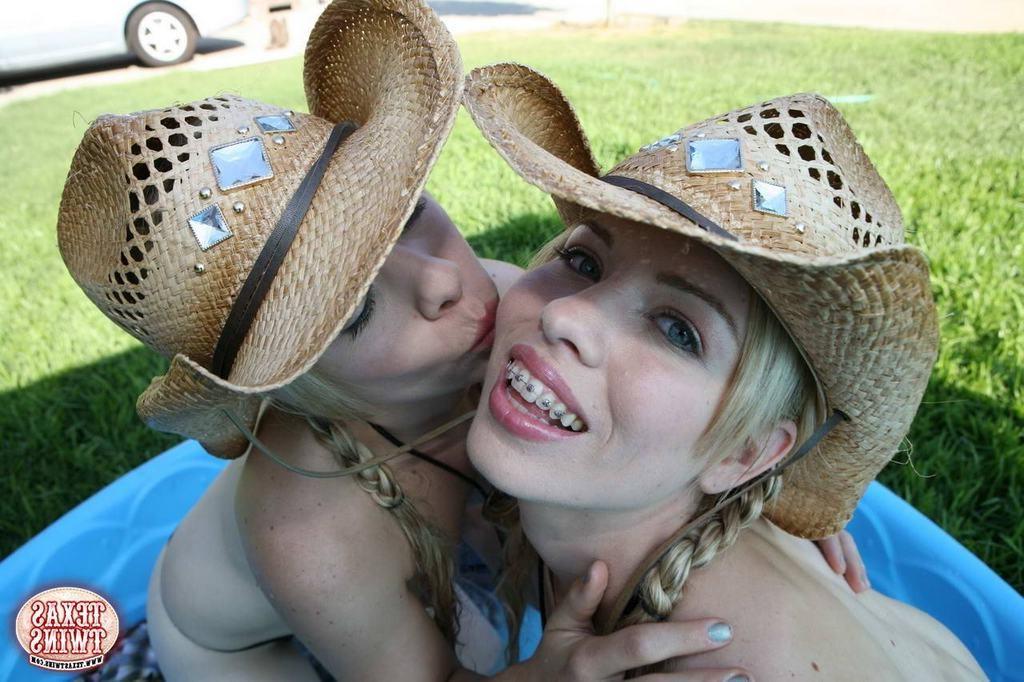 14P Tiny titted eighteen year old twins play in the swimming pool
