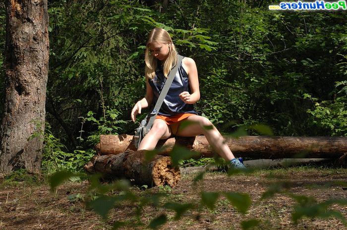 16P Girl stops to smoke a cig and take a leak in woods