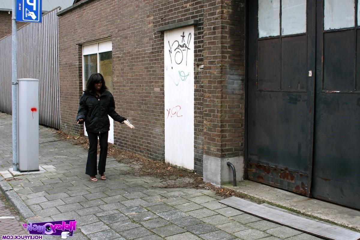14P Ebony girl gets surprised with a cock trough a gloryhole