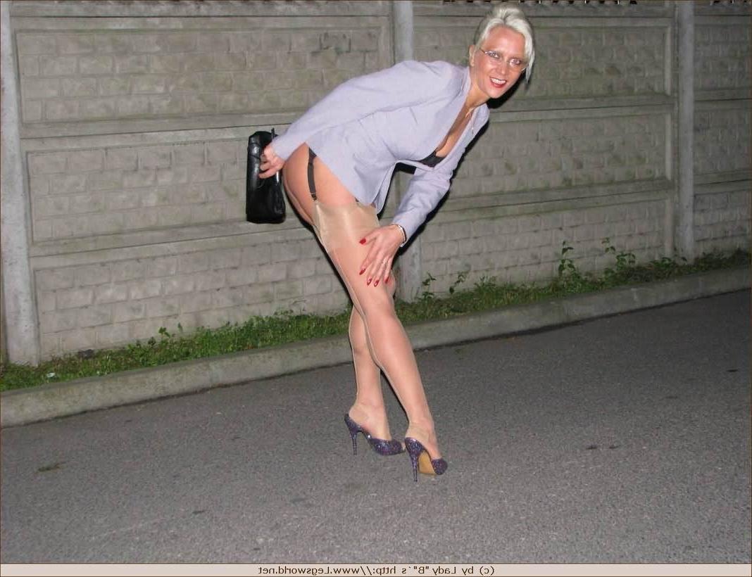 12P Leggy german milf in silk stockings posing in public