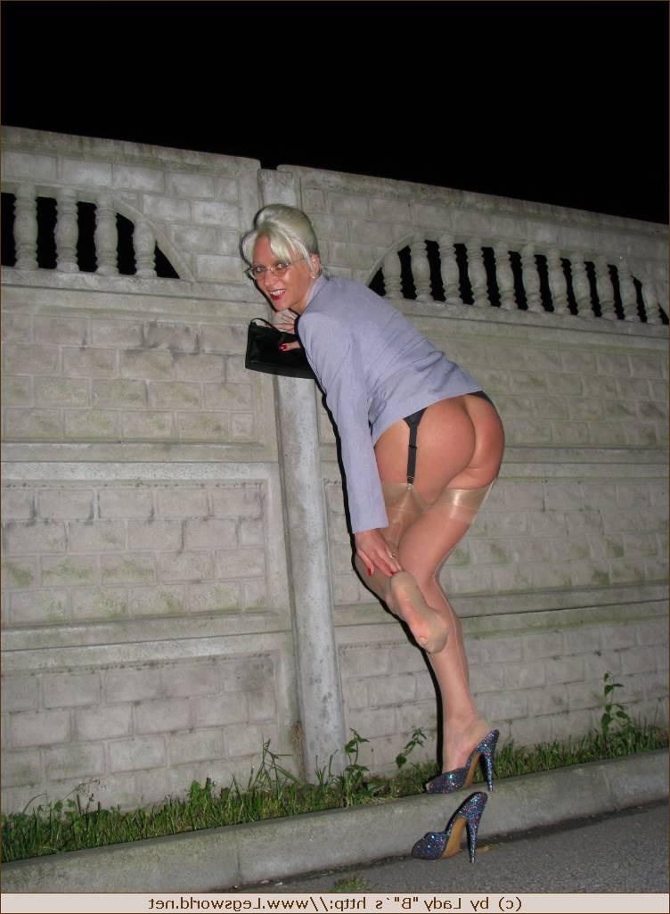 12P Leggy german milf in silk stockings posing in public