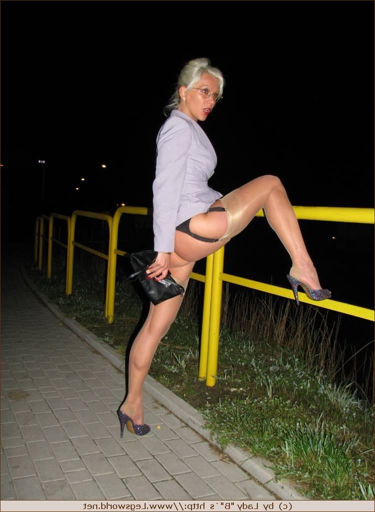 12P Leggy german milf in silk stockings posing in public