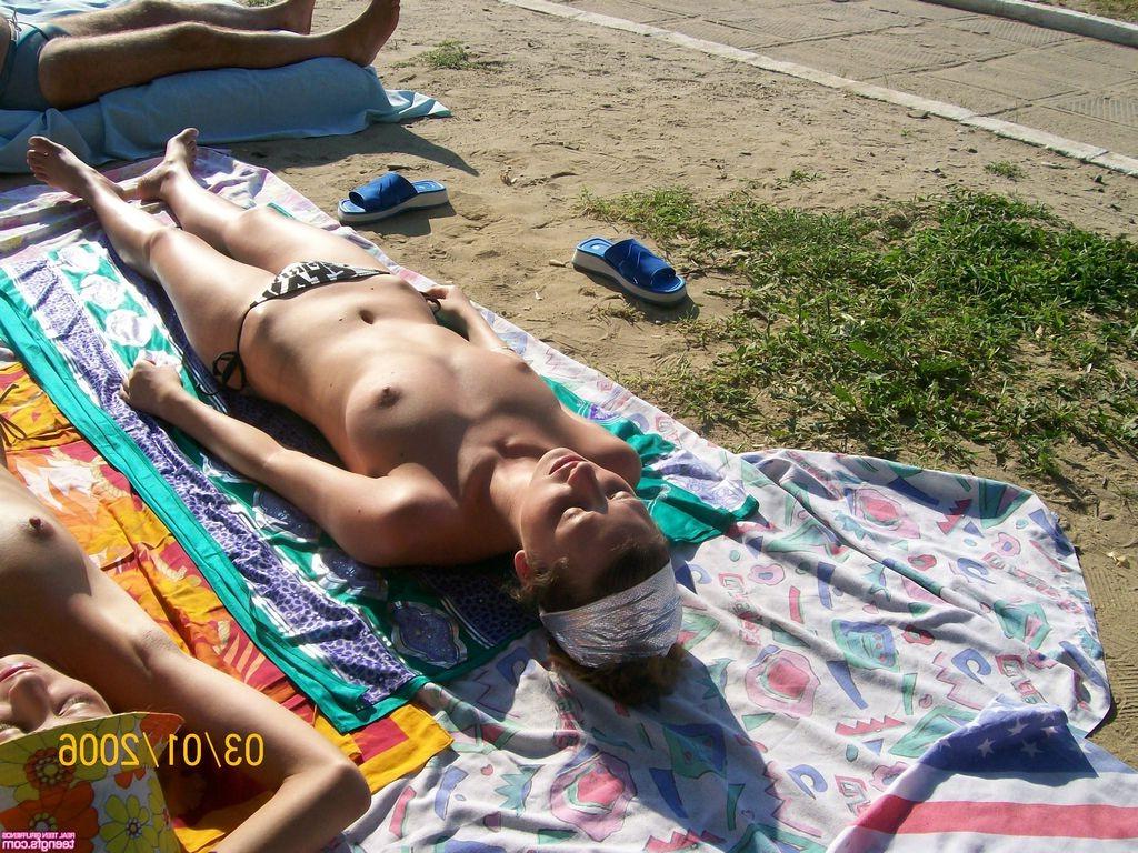 16P Teen cutie tanning topless in public with her friend