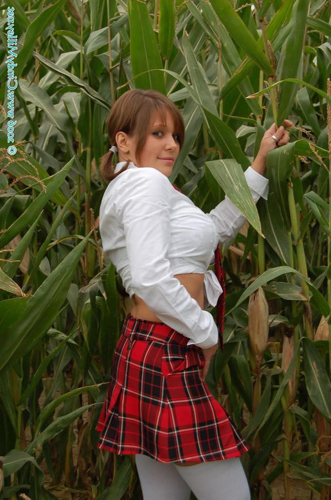16P Very busty schoolgirl Cindy Milley flashing her 30H juggs