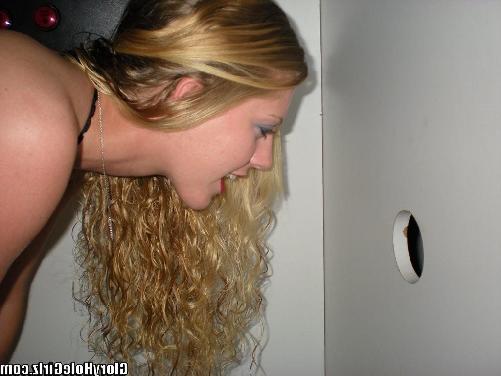 20P Busty babe fucking while sucking strangers cocks at gloryhole