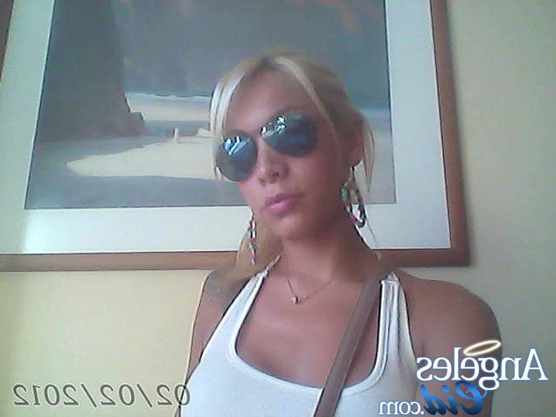 14P Angeles Cid posing in front of her web cam
