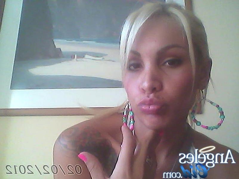 14P Angeles Cid posing in front of her web cam
