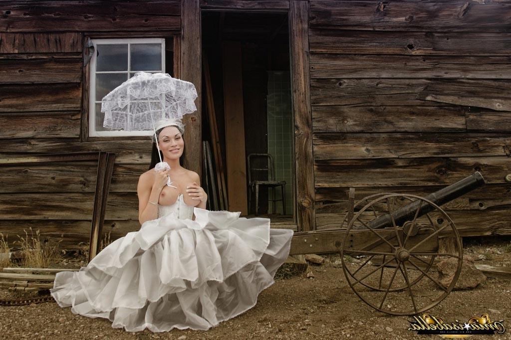 11P TS Mia Isabella posing as a sexy bride