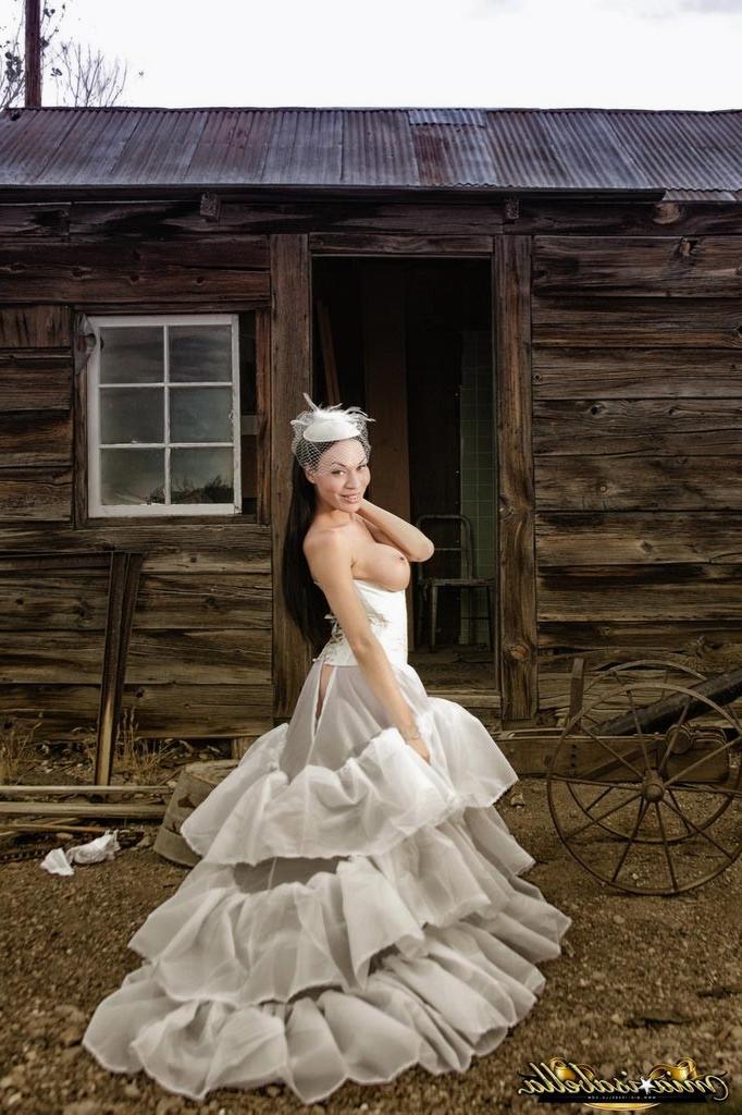 11P TS Mia Isabella posing as a sexy bride