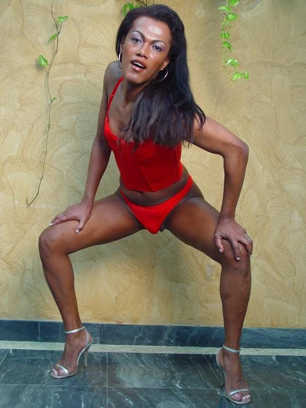 19P Horny ebony tranny loves stripping her lingerie
