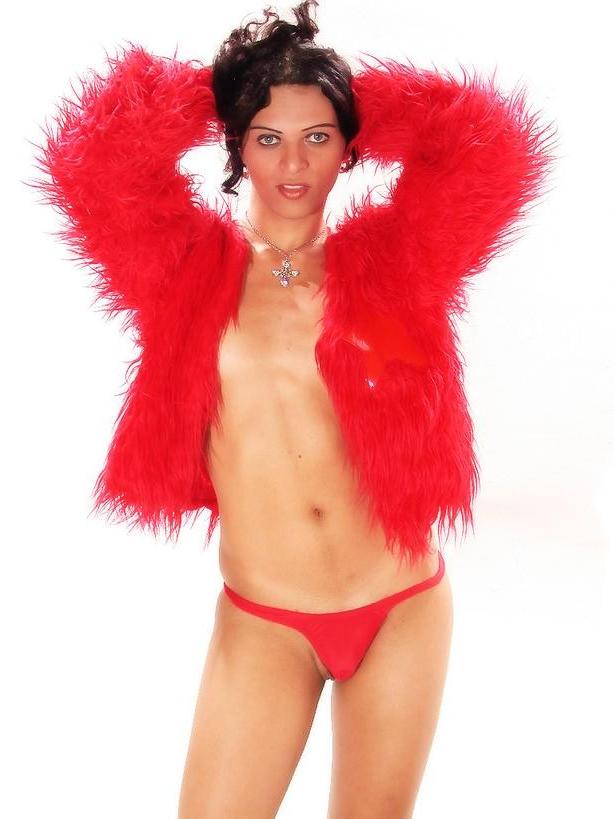 17P Tranny In Red Panties Strips Naked And Holds Cock