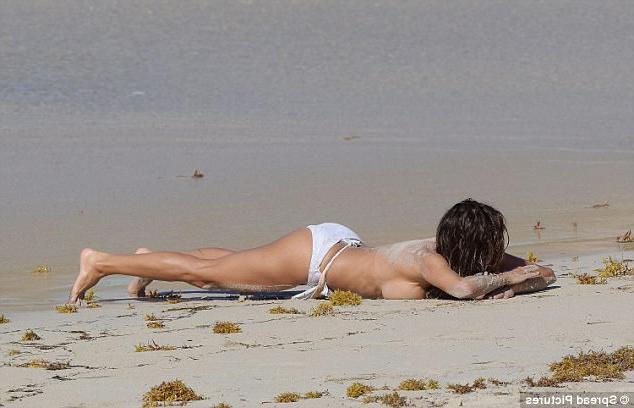 12P Brooke Burke Goes Topless And Gets Wet