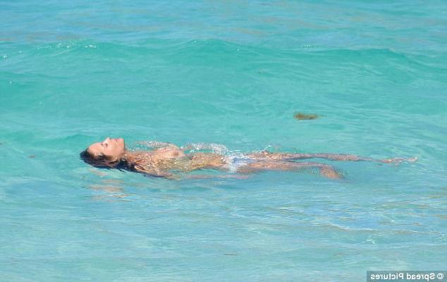 12P Brooke Burke Goes Topless And Gets Wet