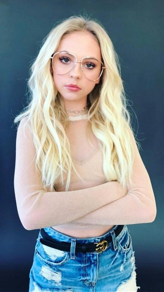 13P Jordyn Jones looking cute in glasses.