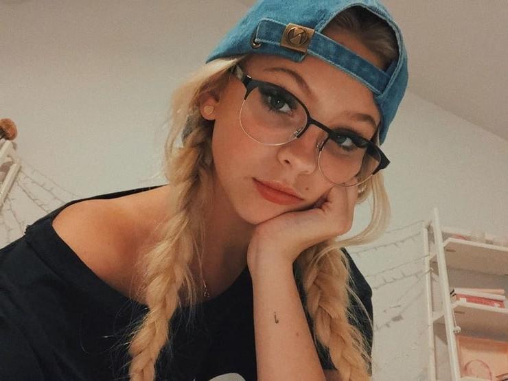13P Jordyn Jones looking cute in glasses.