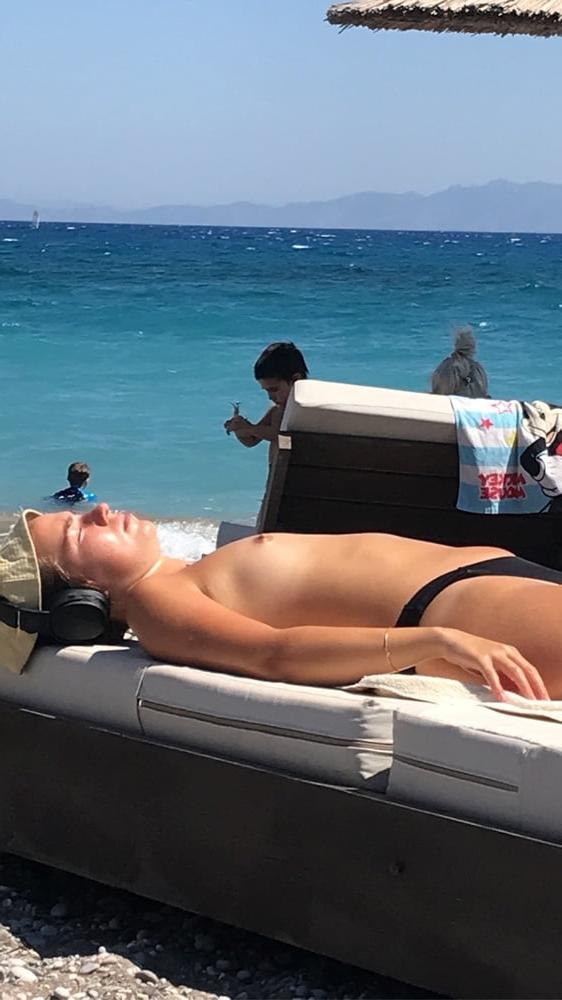 24P Girl #2 Topless at beach in Greece