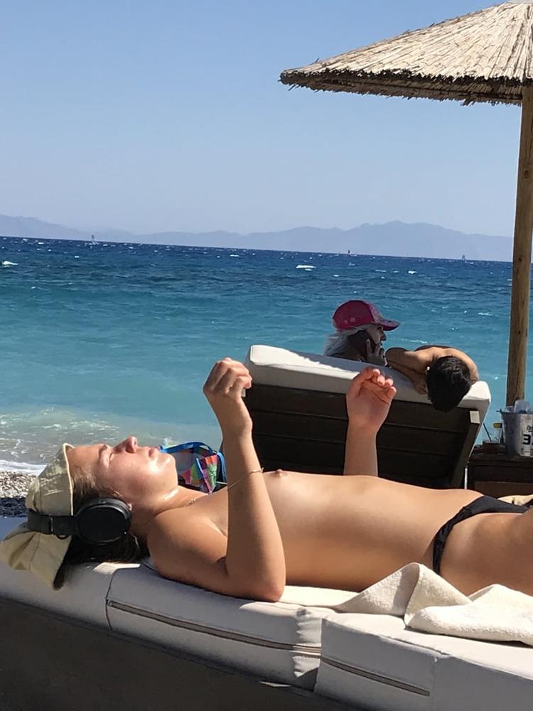 24P Girl #2 Topless at beach in Greece