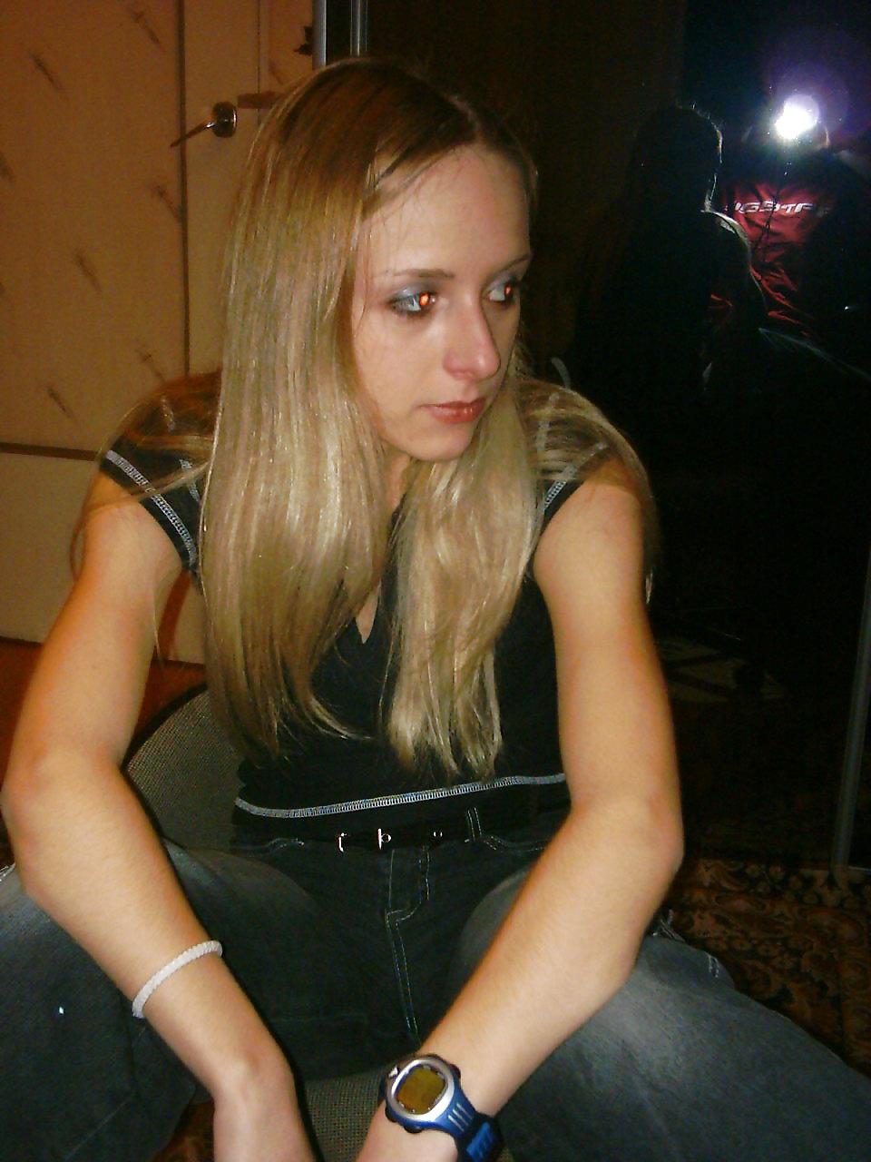 16P Cute blonde girl strips