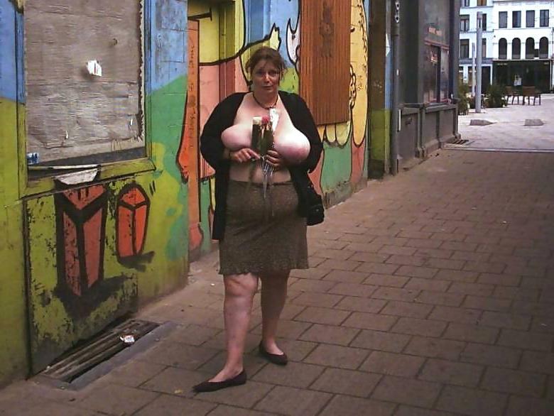 11P Huge Boobed Milf Posing in Public