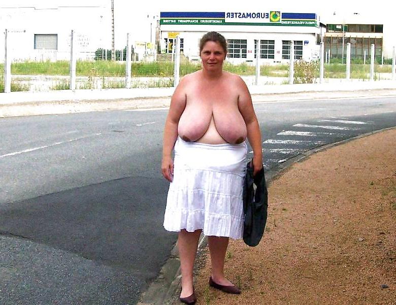 11P Huge Boobed Milf Posing in Public