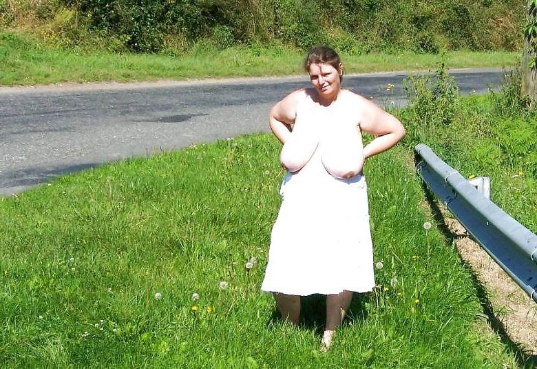 11P Huge Boobed Milf Posing in Public