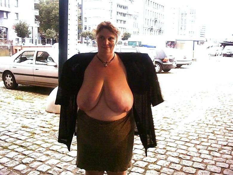 11P Huge Boobed Milf Posing in Public