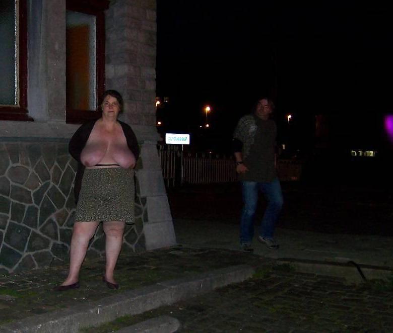 11P Huge Boobed Milf Posing in Public