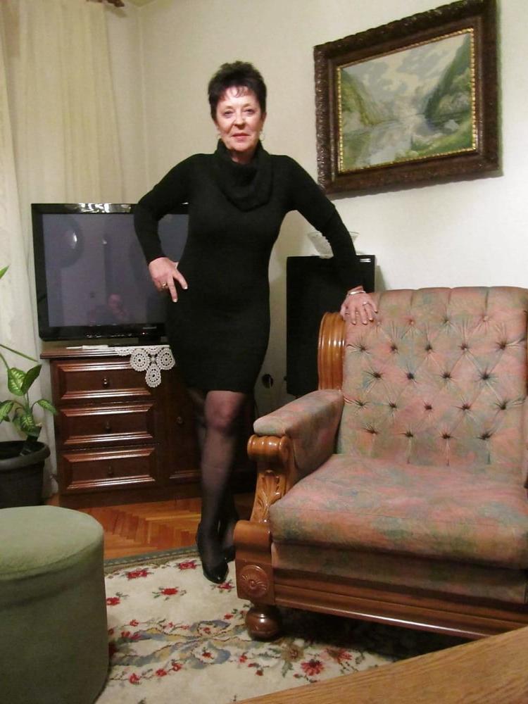 11P Non-nude cute short haired granny