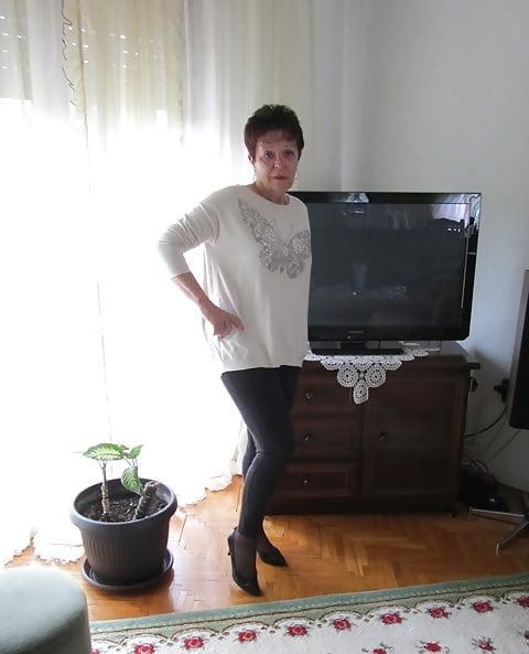 11P Non-nude cute short haired granny
