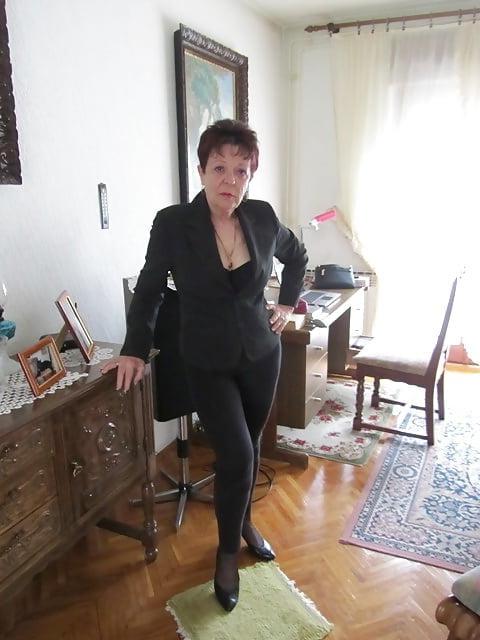 11P Non-nude cute short haired granny