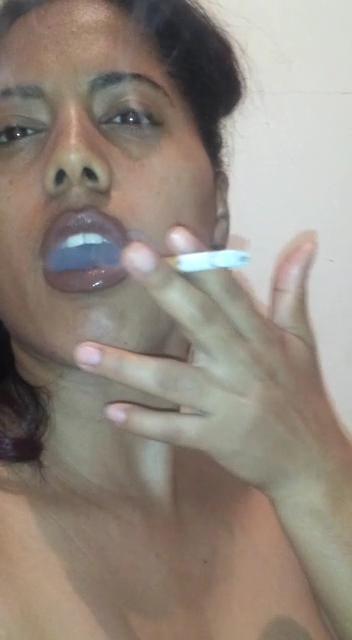 25P hot caribian ebony Awilda smoking cigarette