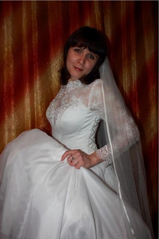 23P Russian MILF in the image of the bride