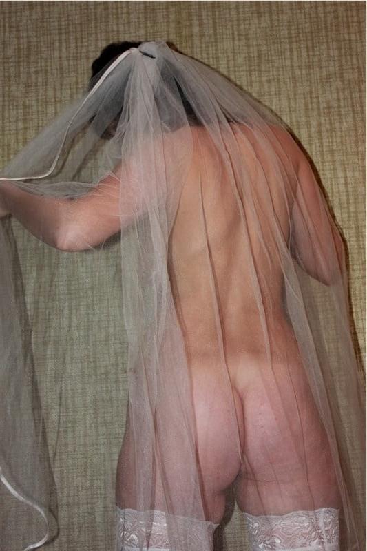 23P Russian MILF in the image of the bride