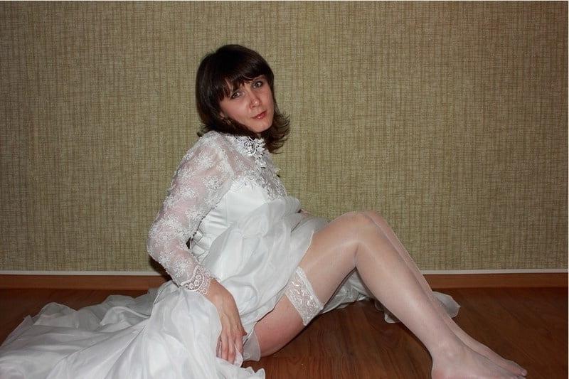 23P Russian MILF in the image of the bride