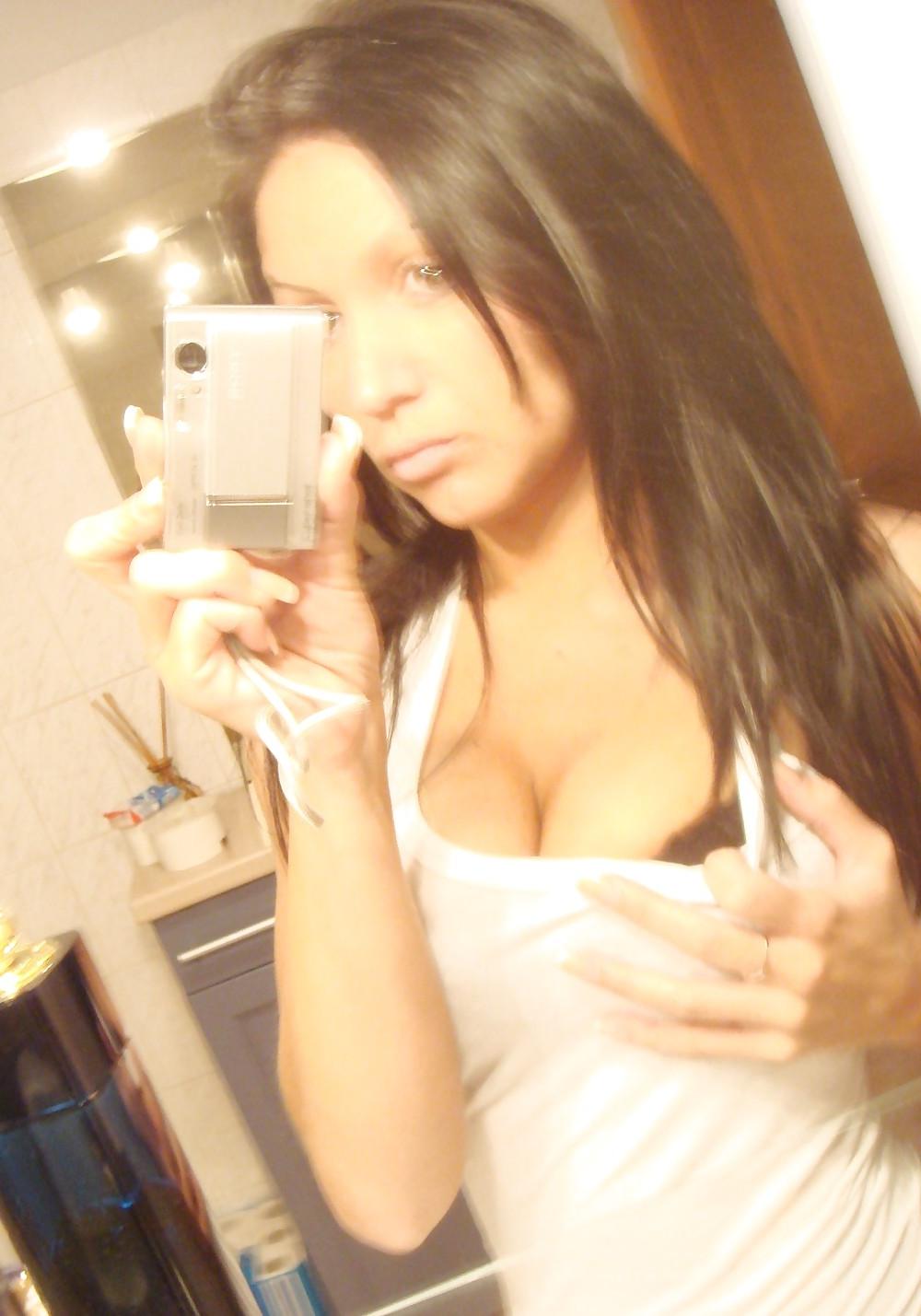 24P Cute girl in front of her mirror