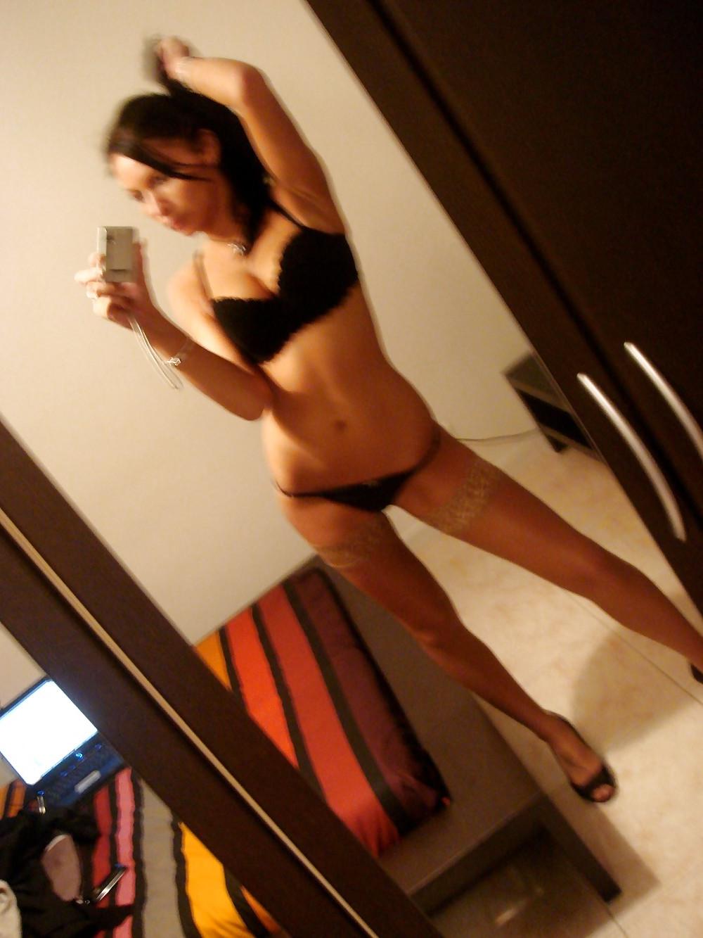 24P Cute girl in front of her mirror