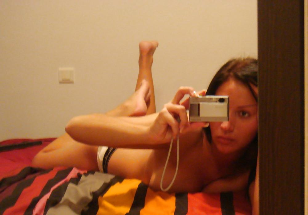 24P Cute girl in front of her mirror