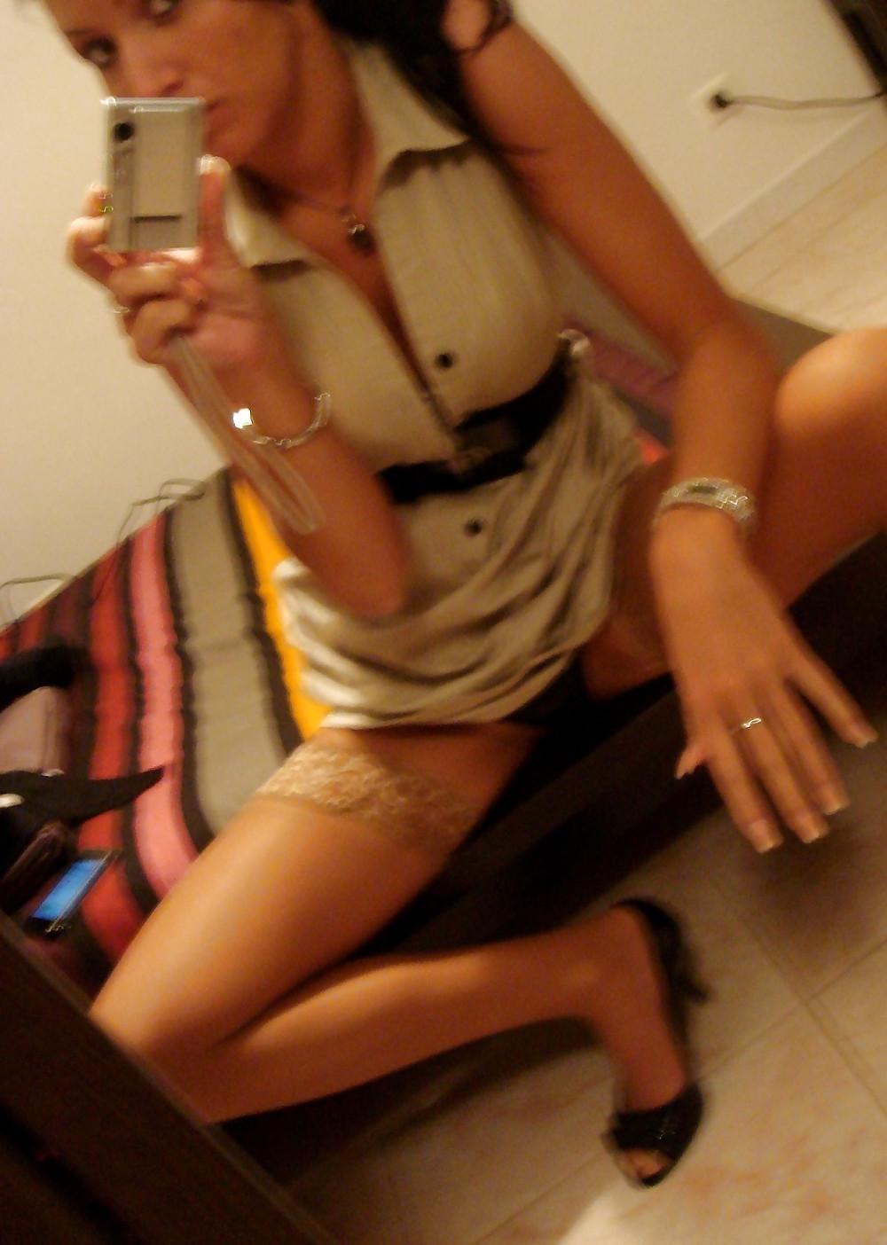 24P Cute girl in front of her mirror