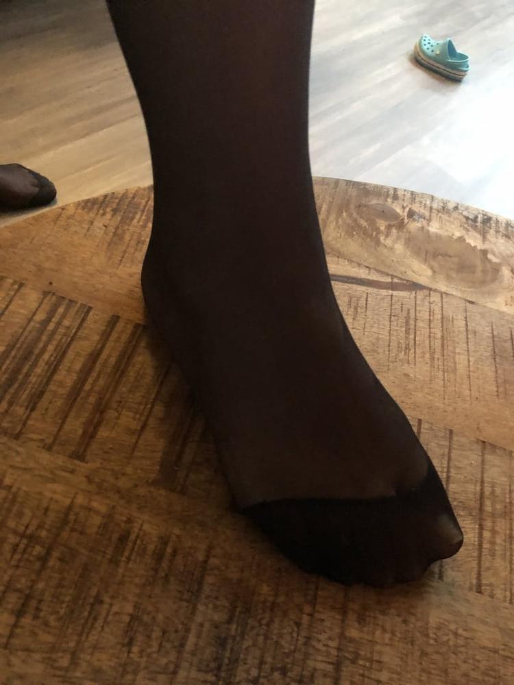 9P Feet in black stockings
