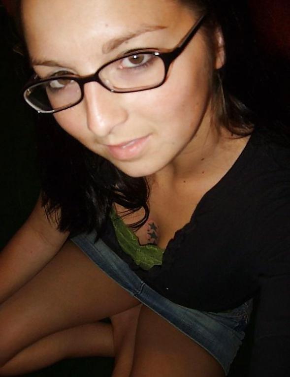 9P Brunette with glasses and jeans skirt