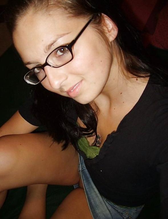 9P Brunette with glasses and jeans skirt